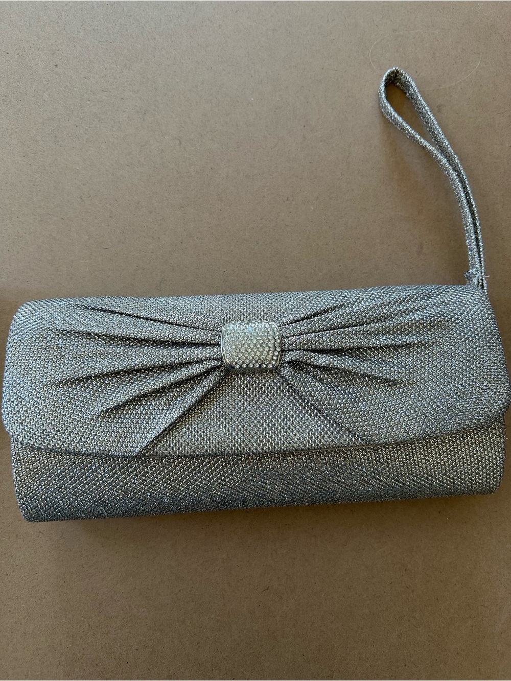 Shimmer Bow Evening Wristlet Clutch in Silver with dust bag
